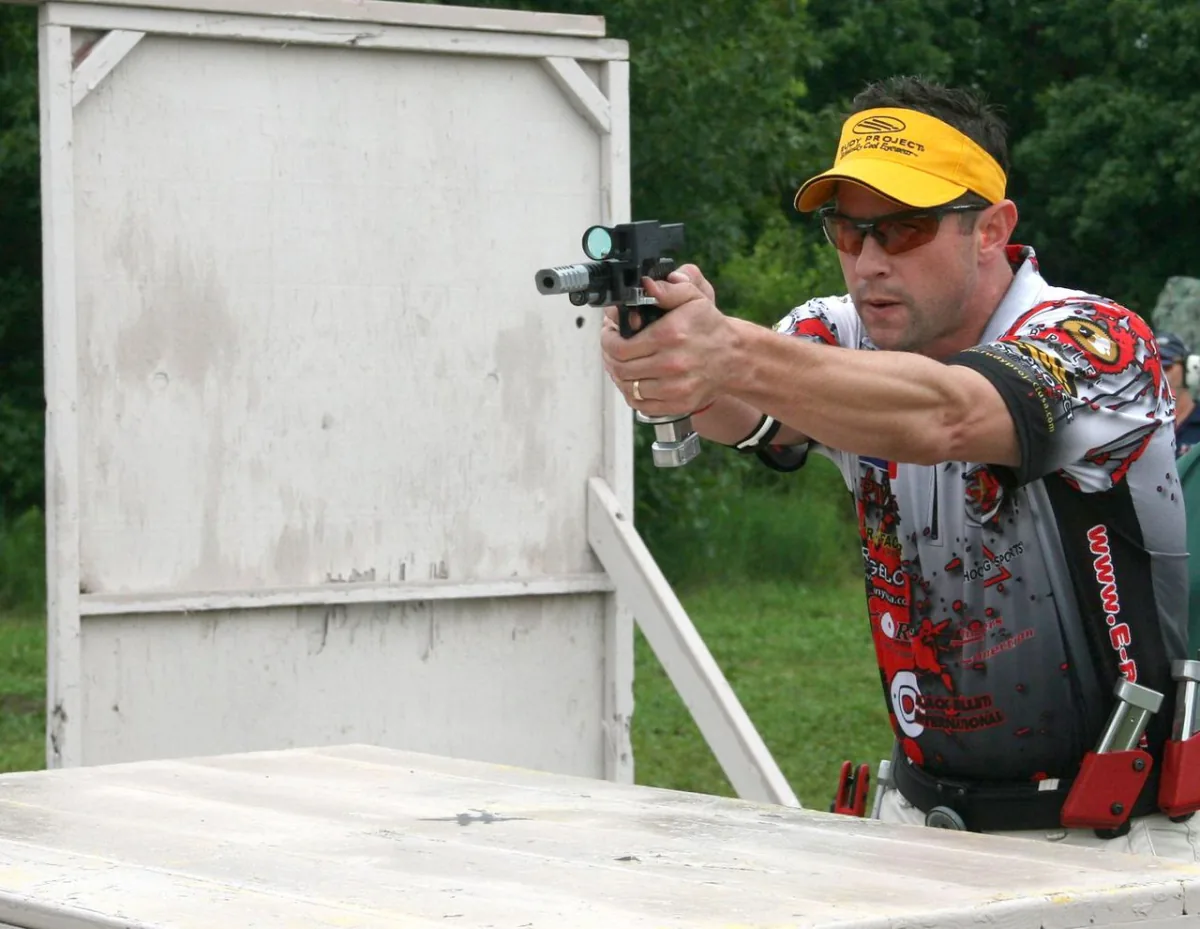 Competition shooter on a stage